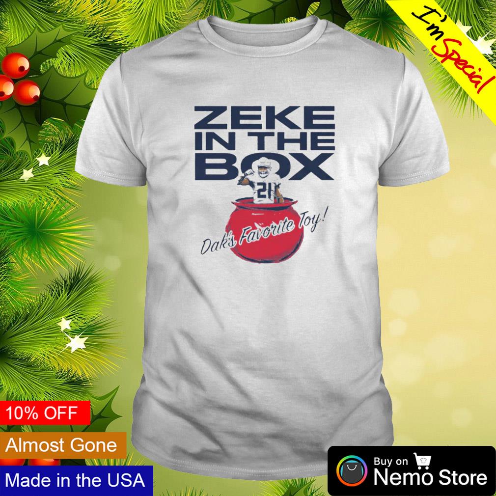 Zeke in the box Dak's favorite toy shirt