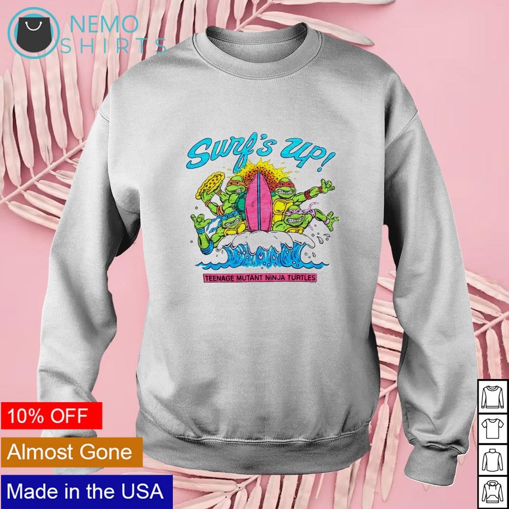 https://images.nemoshirt.com/2023/05/Surfs-up-teenage-Mutant-Ninja-Turtles-shirt-Mock-Up-Nemo-sweater-white-.jpg