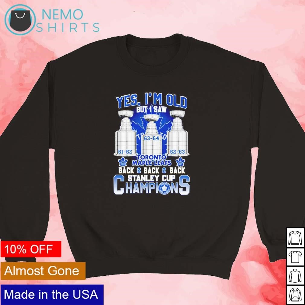 https://images.nemoshirt.com/2023/10/Yes-Im-old-but-I-saw-Toronto-Maple-Leafs-back-2-back-2-back-stanley-cup-champions-shirt-new-mockup-black-sweater.jpg