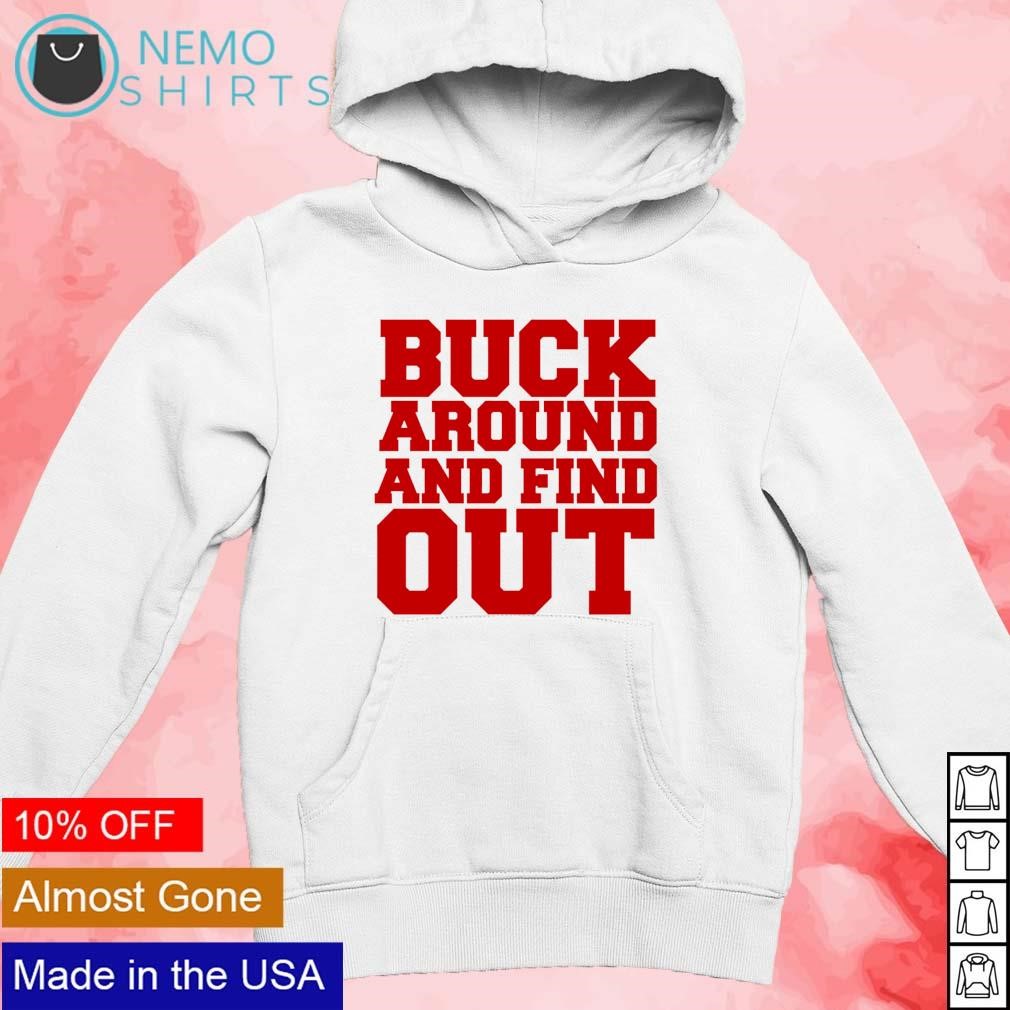 https://images.nemoshirt.com/2023/11/Buck-around-and-find-out-Ohio-State-Buckeyes-gameday-shirt-new-mockup-white-hoodie.jpg