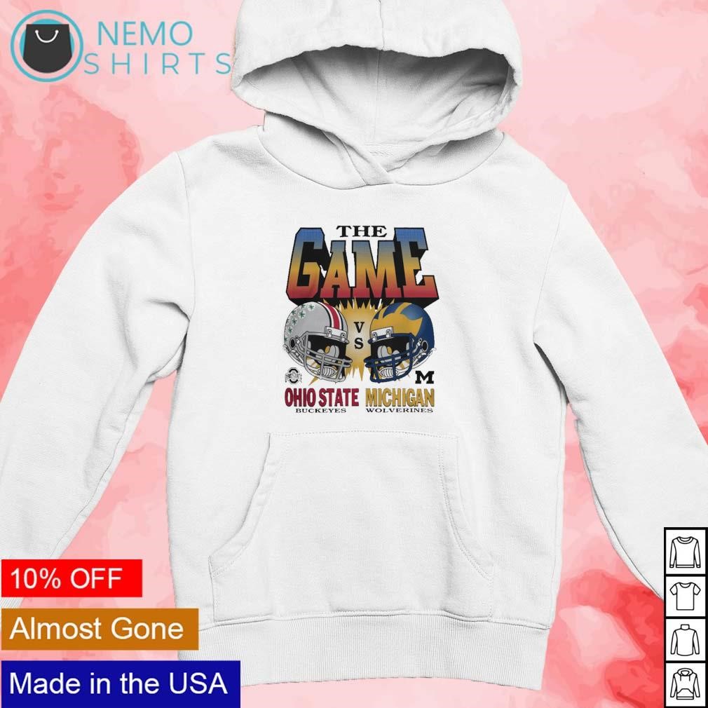 https://images.nemoshirt.com/2023/11/The-game-Ohio-State-Buckeyes-vs-Michigan-Wolverines-helmet-shirt-new-mockup-white-hoodie.jpg