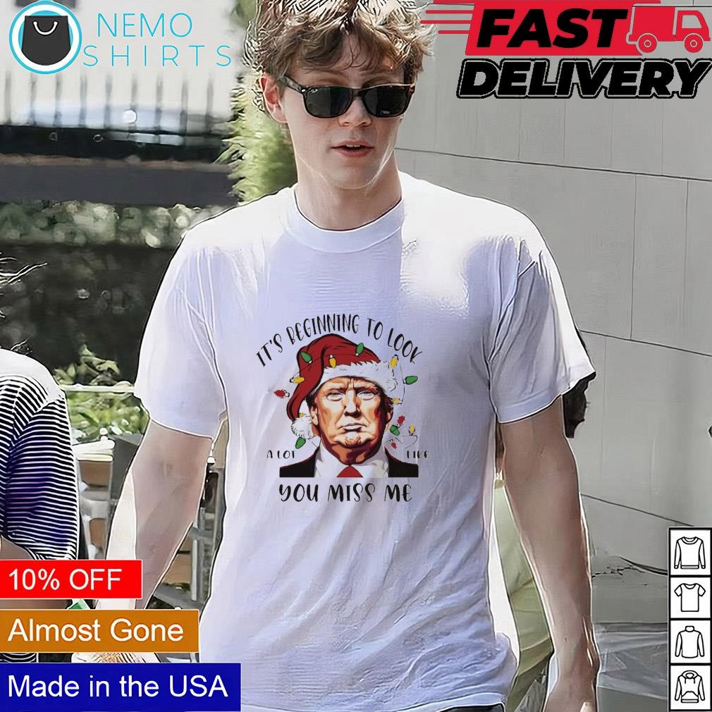 Donald Trump with Santa hat it s beginning to look a lot like you